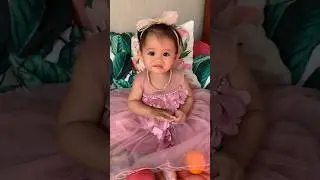 Qian fitting her Baptismal outfit 