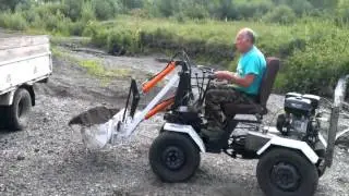 Погрузка речного песка самодельным погрузчиком.
