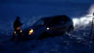 Колеос в снегу