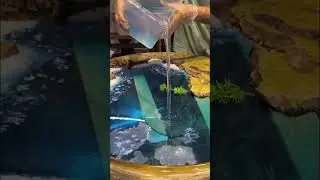 The perfect combination of exotic materials and resin - resin river table