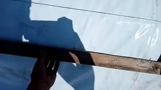 Перфорация плёнки на буграх под посадку.