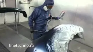 Покрытие бампера лаком после окраски