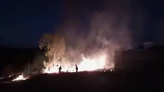 Dois homens apagando fogo indo pra sua casa
