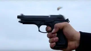 Shooting Beretta m9 blank pistol in slow motion