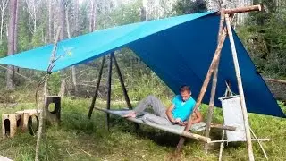 Canopy + table + bed + bench in one of the lawyer Egorov