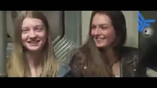 A man makes all the people in the train laugh