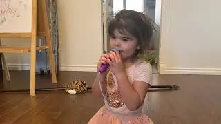 Frozen - Let it go! Miley singing frozen song while Oskar causes a ruckus in the back.