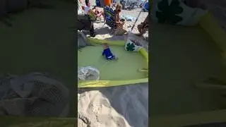10/10 recommend bringing a fitted sheet to the beach for your little one!