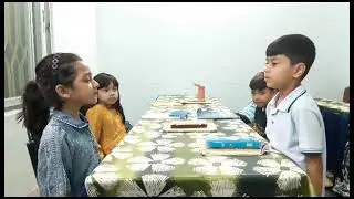 Cute Conversation Two Students in British Language Club