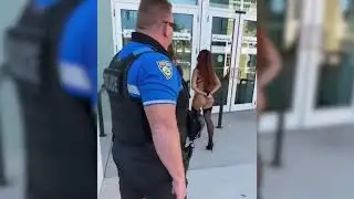 Miami beach cop appears in half naked models' fake arrest video