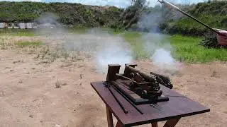 The firing of an eighth scale English 12 Pounder naval gun.