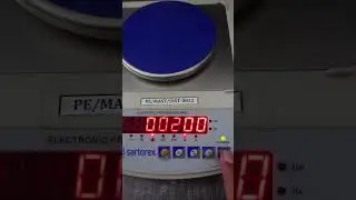 Branded Sartorex weight machine calibration.