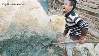 طفل الخرسانه , شاهد طفلاً يعمل في الخرسانة يساعد والده
