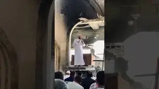 Palestinians perform Friday prayer at a destroyed mosque in Gaza