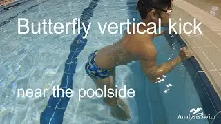Butterfly vertical kick near the poolside