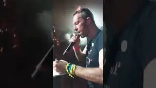 Chris Martin autographing during Fix You