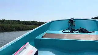 Boating on plane through the West Okaw River