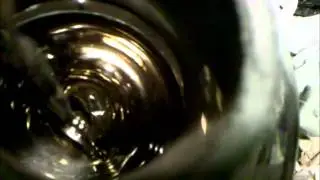 Singing sculpture and reflection inside mirror globe