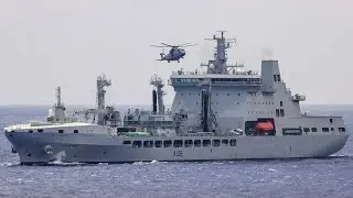 Carrier Strike Group conducts vertical replenishment in the South China Sea