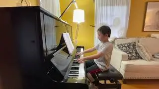 Etude from John Thompson’s modern course for the piano the second grade book