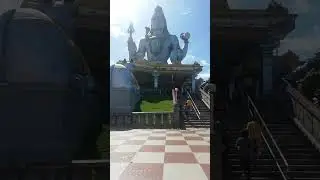 Climbing Stairs to Murudeshwar Shiva statue
