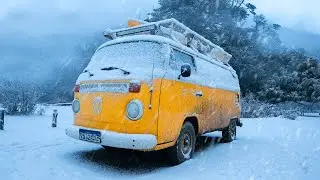 Camping With Snowfall in a Small Van