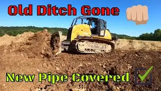Did all our hard work pay? Backfilling the pipe and filling in the ditch with the case 1650m dozer.
