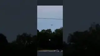 UFO seen floating on a highway in USA