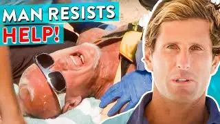 5 Lifeguards and 2 Paramedics Needed To Restrain Man!