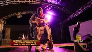 STECIA MAYANJA PERFORMS IN A WHEEL CHAIR