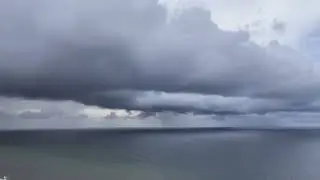 Impressive Shelf Cloud Looms Over Beach