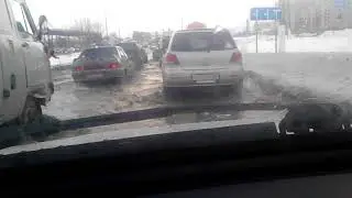 разлив воды на Топольчанской в Саратове