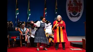Prof Antjie Krog recites a poem after receiving her honorary doctorate