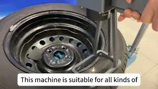 Easy-to-use handheld laser marking machine  marking the logo on the tires of new energy vehicles.