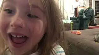 Little Girl Eating Candy