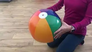 Colorful beach ball pop