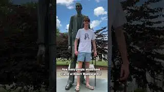Standing next to the tallest man in the world 