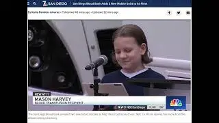 Mason cutting the ribbon for the San Diego Blood Bank two new blood mobiles on San Diego NBC 7.