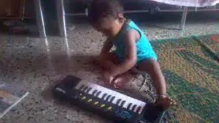 Little Girl playing piano i'm different