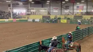 Co & American flag + Sponsor runs CSU Skyline Stampede Rodeo