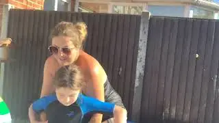 Dad vs mum swimming pool wrestling match