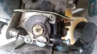 Gasoline trimmer carburetor adjustment