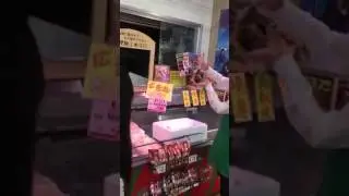 Floating crab magic trick at market