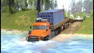 Overloaded truck driving through a damaged road on a mountain - spintires mudrunner