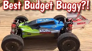 WLtoys 144001 RACES at the TRACK against 1/10 Buggy’s!