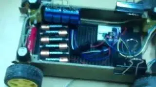 Arduino UNO tank. HC-SR04, 4WD, 18650, relay control. First version. RUS