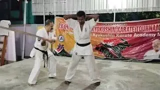 wood breaking on stomach (Tameshiwari)