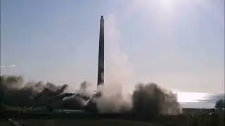 controlled demolition of a power plant