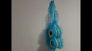 porta rollo de papel higiénico hecho con botellas recicladas    
