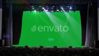 People Sit in the Auditorium and Look at the Green Screen | Stock Footage - Envato elements